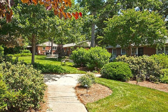 Beautiful tree lined sidewalks welcome you to your new apartment home!