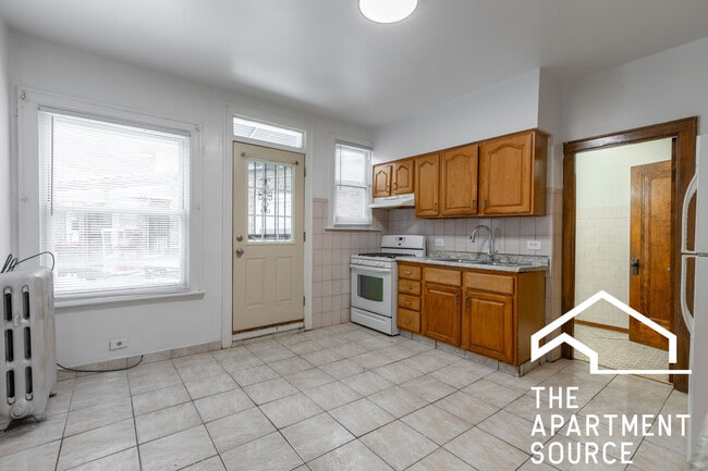 Building Photo - 4165 N Milwaukee Ave Unit 2