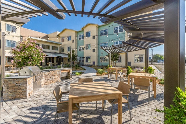 Contemporary Courtyard with Grill at Morgan Hill Senior Housing - Morgan Hill Senior Housing - Specials