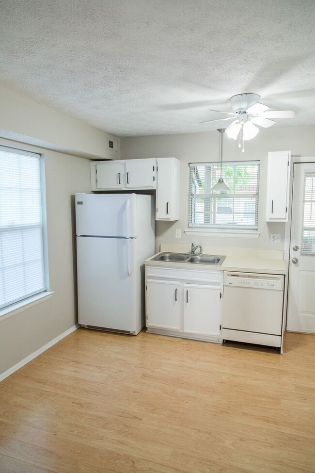 Photo - Enjoy Freshly Painted Open Floor Plan! Unit 1