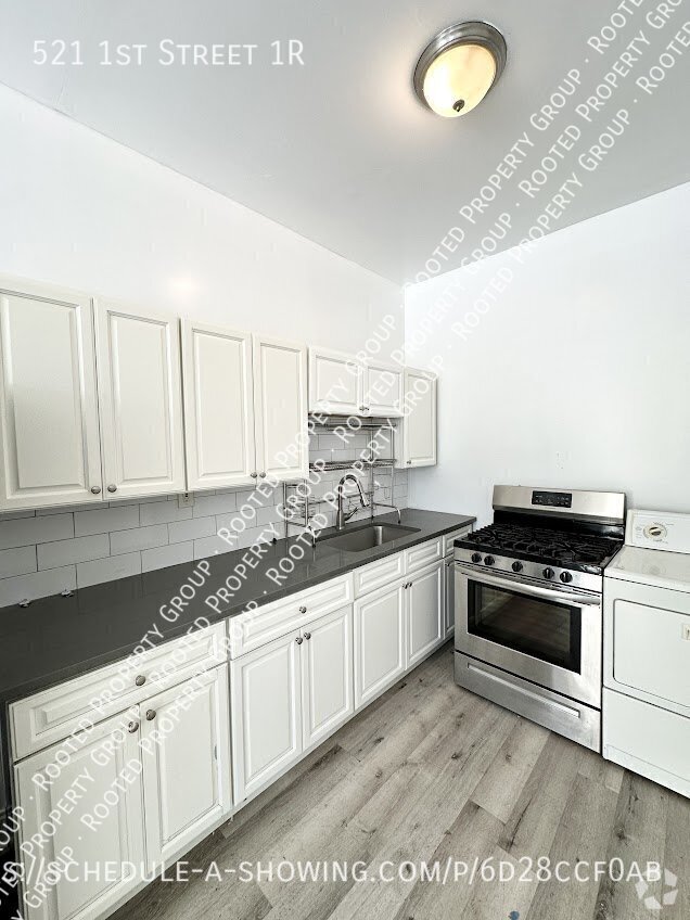 Building Photo - Cozy 1 Bedroom Unit with Parking & Laundry... Rental