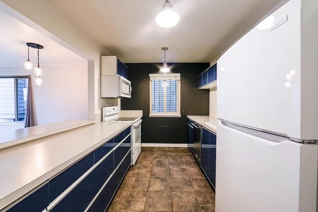 Photo - Spacious Pet-Friendly Condo with Parking! Unit D