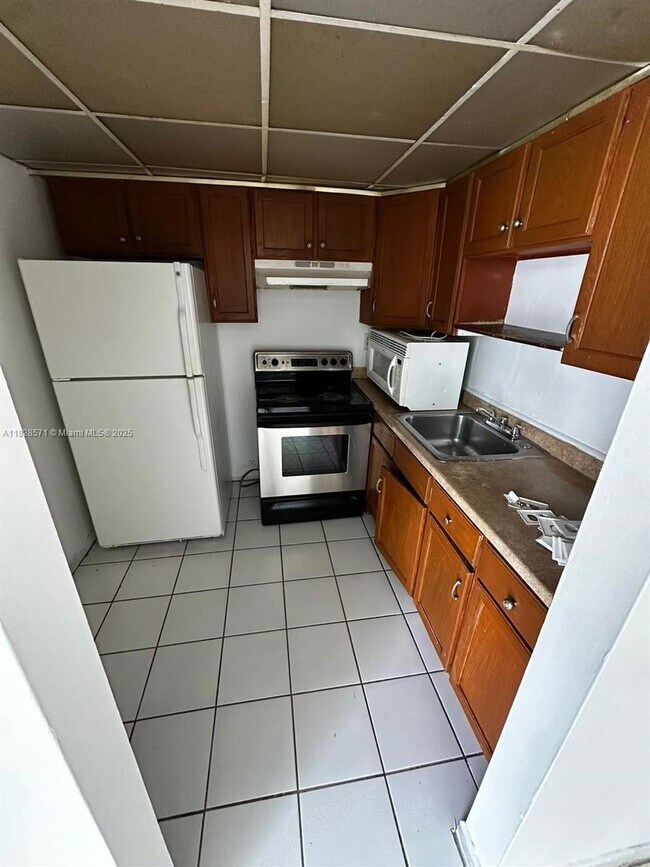 Photo - 496 NW 165th St Apartamento Unidad D416