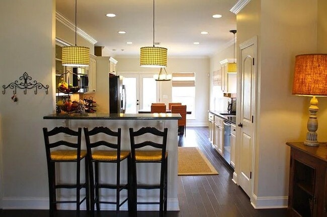 View of Kitchen and Dining from Living Room - 1305 Westvale Dr
