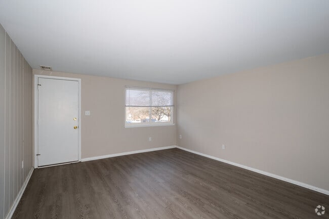 1BR, 1.5BA - 810SF - Living Room - Cedar Village Apartments and Townhomes