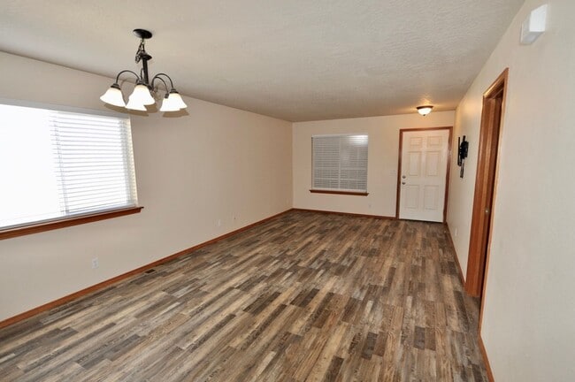 Building Photo - 6364 W Trestle St Unit 1