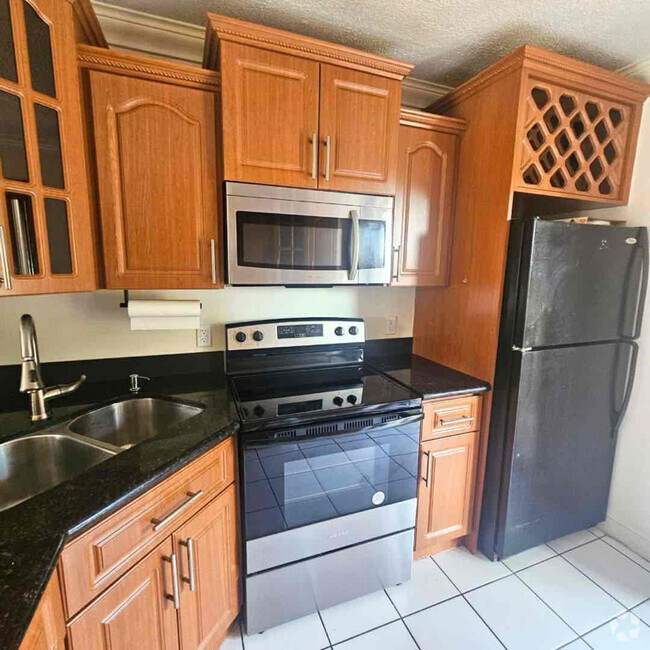 Building Photo - 5460 W 21st Ct Rental