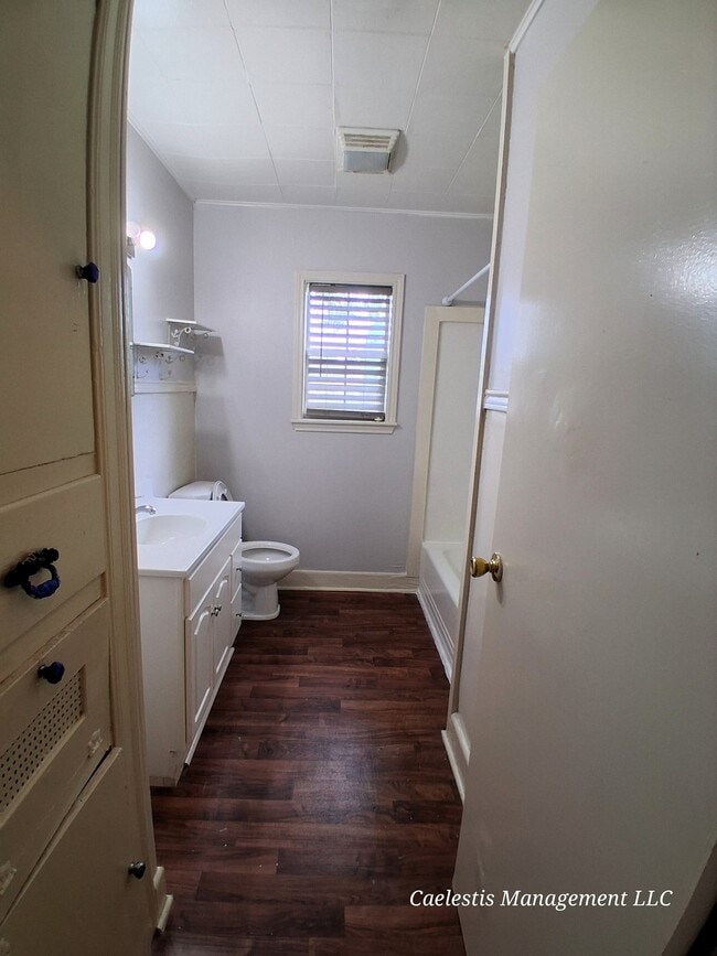 Step into a sleek bathroom featuring modern fixtures and a calming atmosphere - 2412 8th St