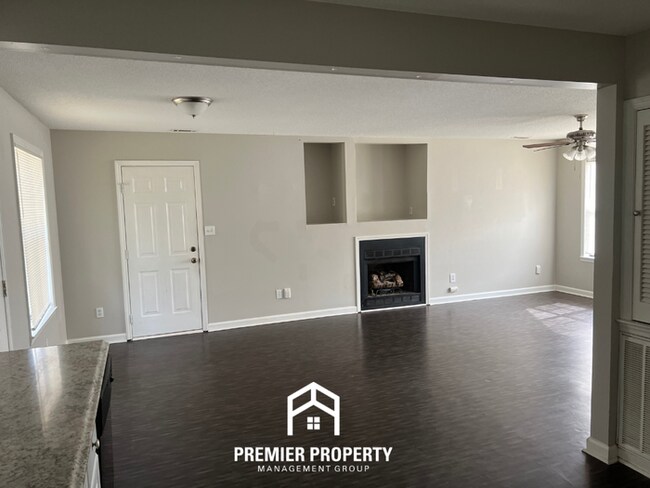 Photo - Charming 3BR/2BA Home in Huntsville | Hardwood Floors, Fireplace & 2-Car Garage